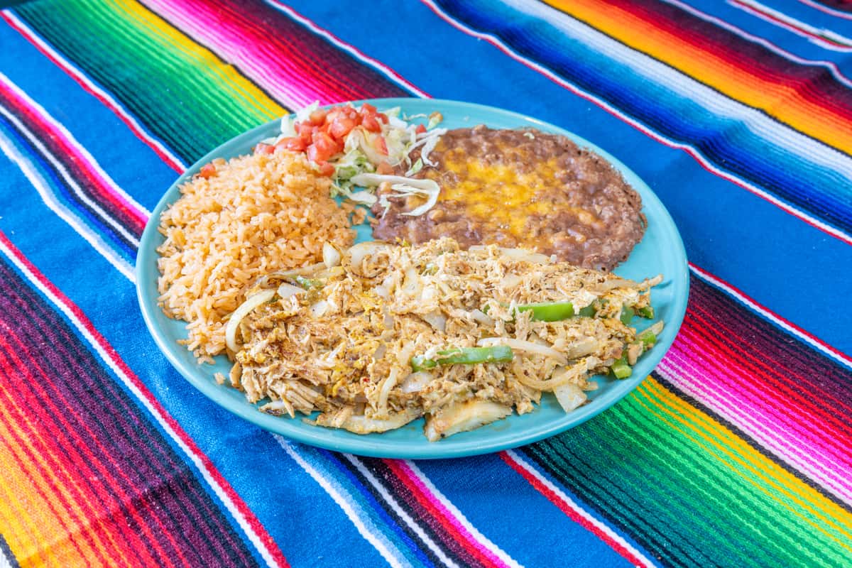Machaca dish on a round blue plate