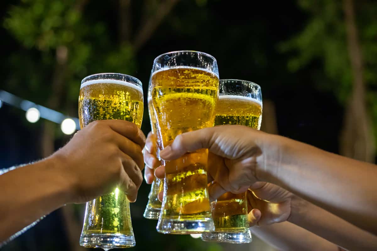 People holding beers