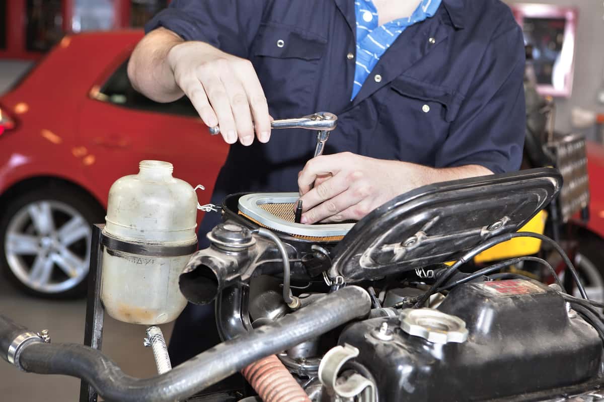 technician working on engine
