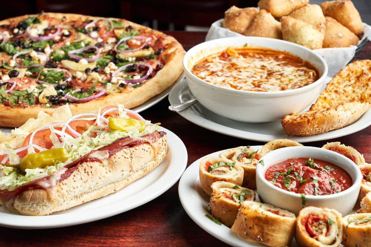 Submarine sandwich, pizza, minestrone soup and pizza rolls