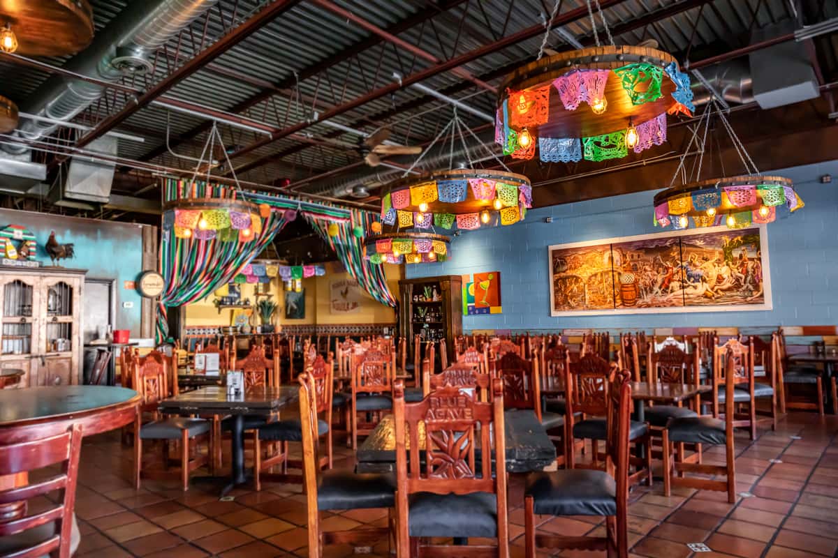 Fernando's Dining Room with tables, chairs and colorful hanging decorations