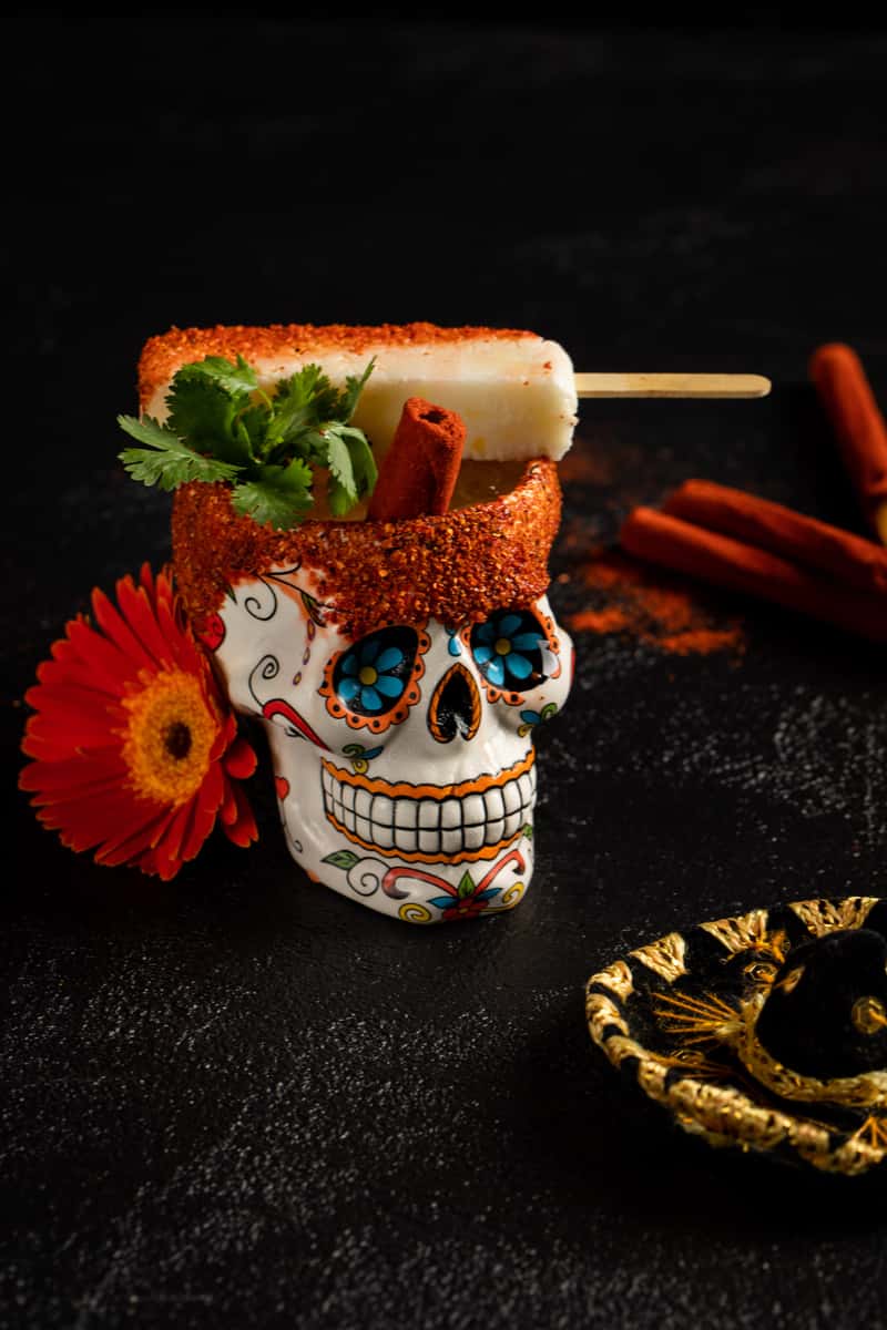 sugar skull glass with popsicle on top