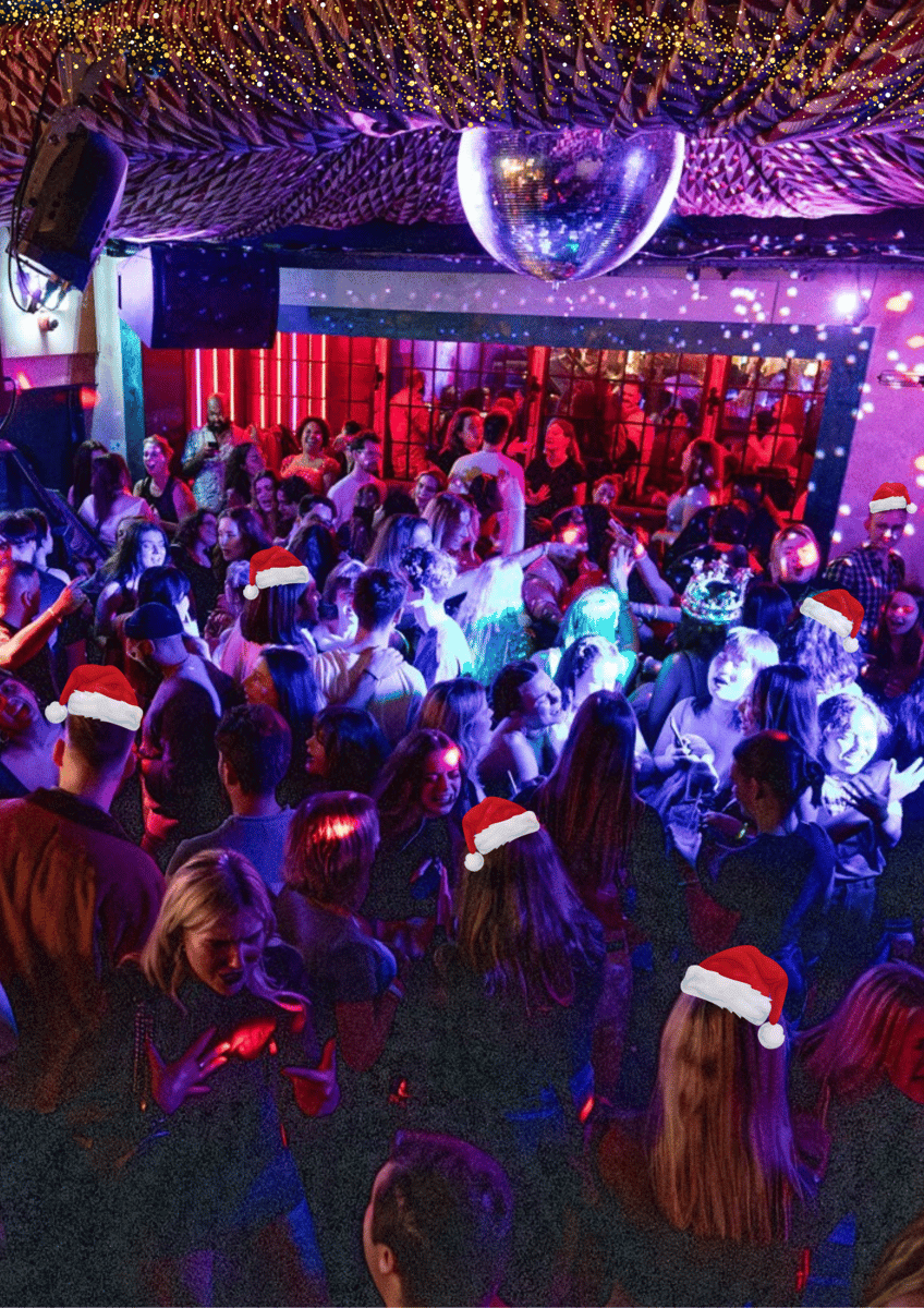 picture of people dancing on the big chill dance floor wearing party hats