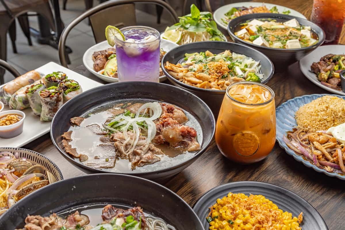 A spread of various foods and drinks on a table