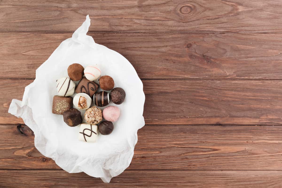 Chocolate candies on a wooden table