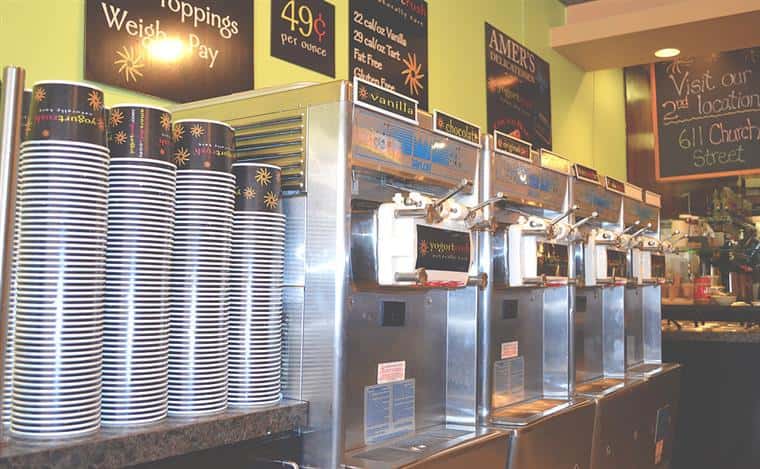 Yogurt machines with cups.