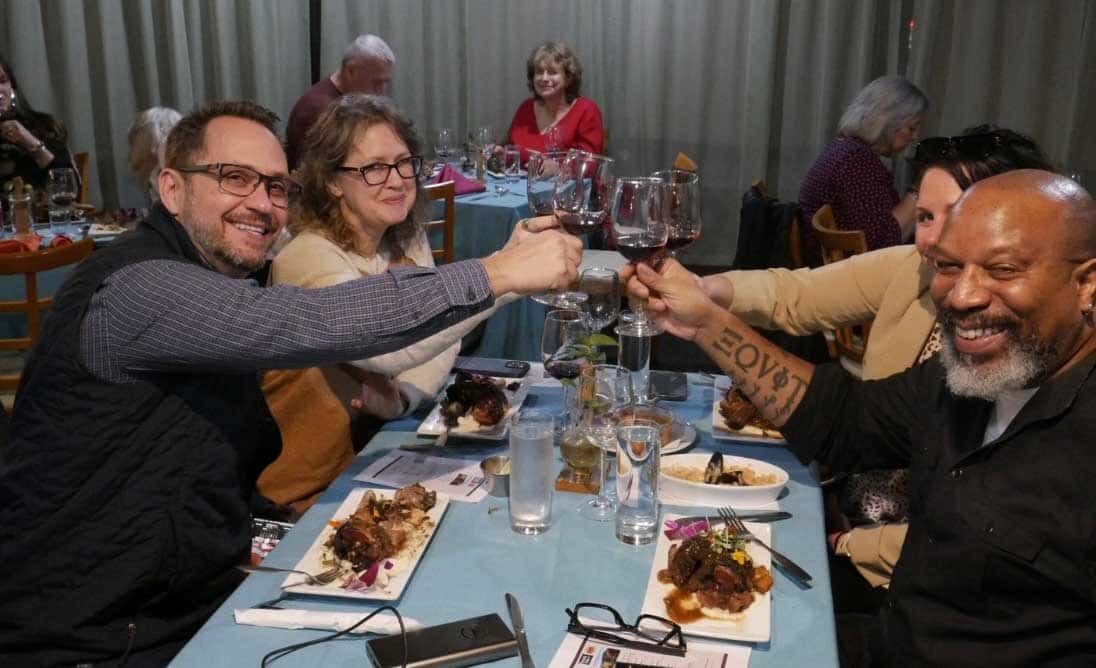 Happy people toasting