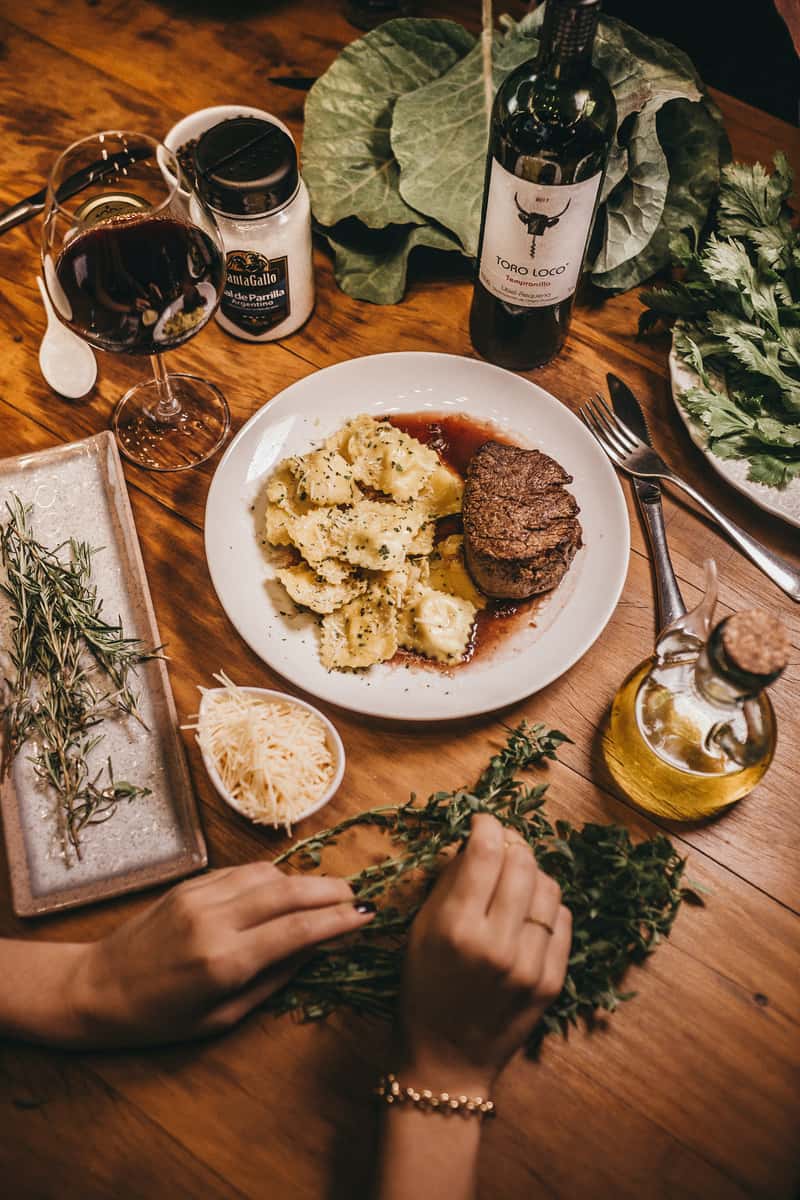 Raviolli, steak, cheese, olive oil, herbs and spices and wine