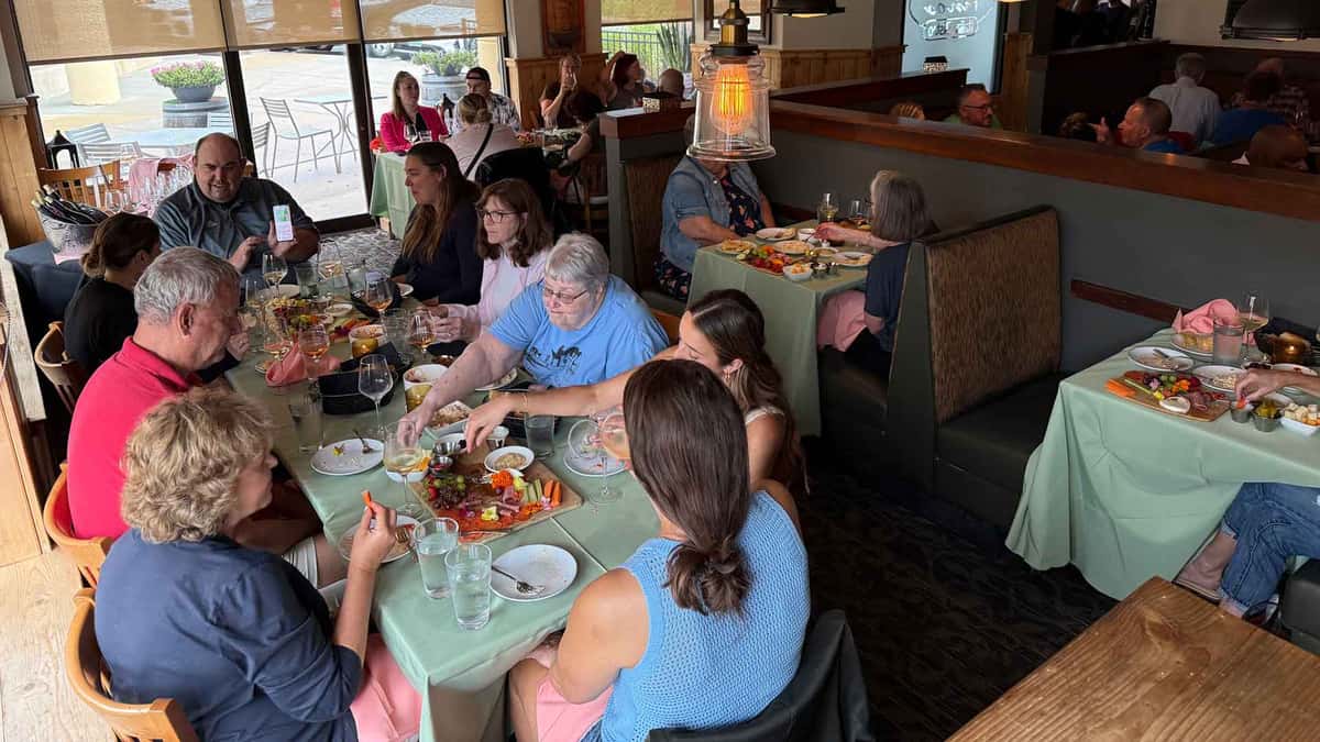 People enjoying catering at Tino's in Columbia