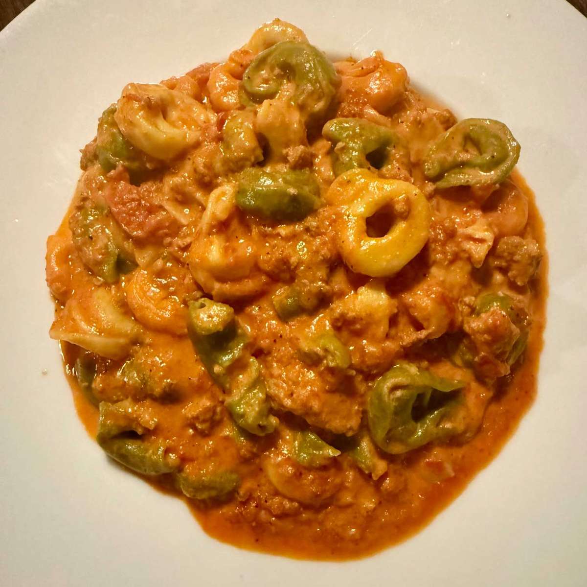 Cheese tortellini sautéed with ground veal in a rose cream sauce