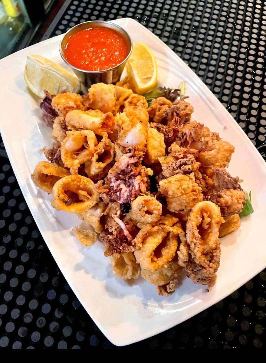 Fresh calamari lightly breaded, fried golden brown & served with Tino's house made marinara