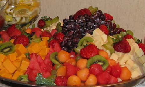 Fruit and cheese on plate