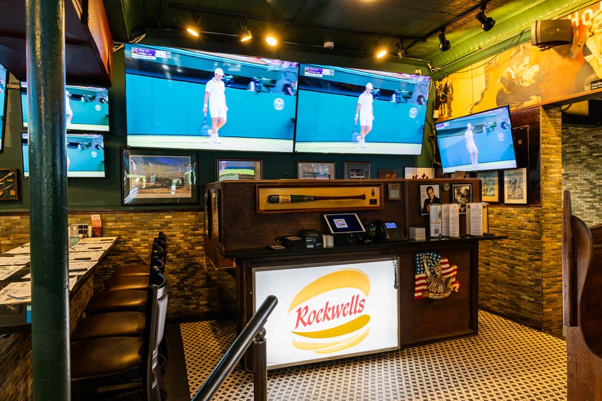 Interior of Rockwells Bar & Grill with sports TVs