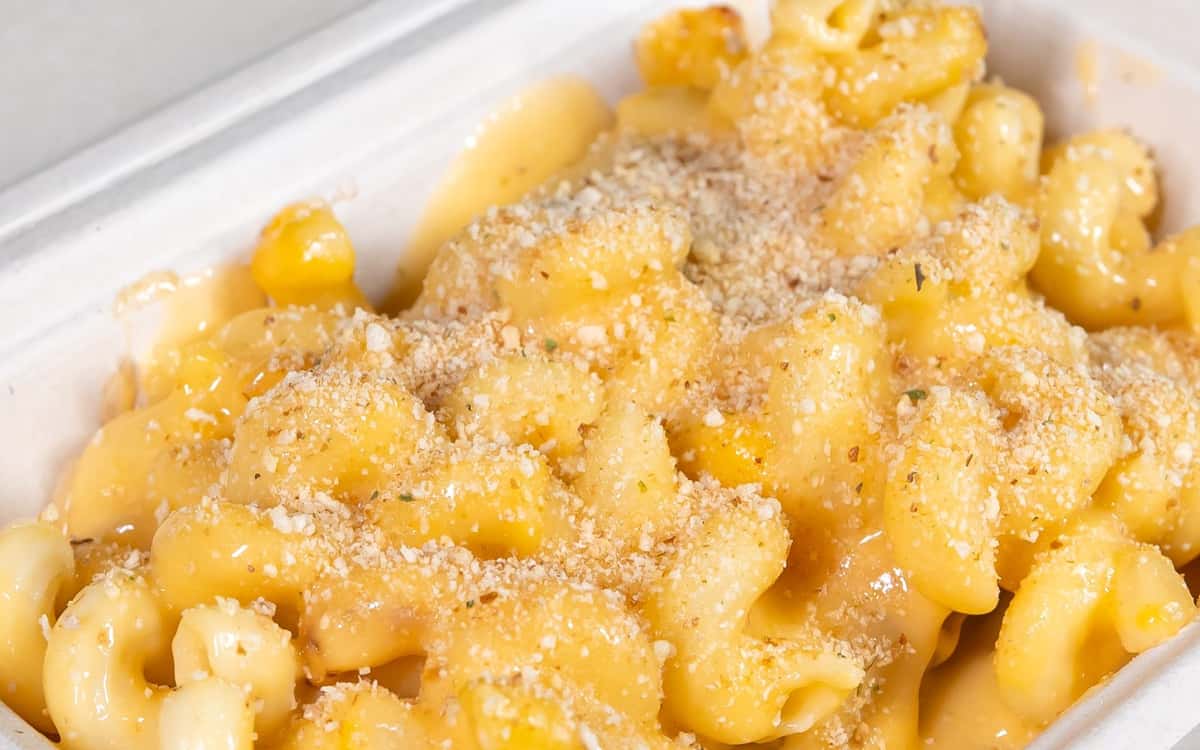 Close-up of mac and cheese topped with golden breadcrumbs