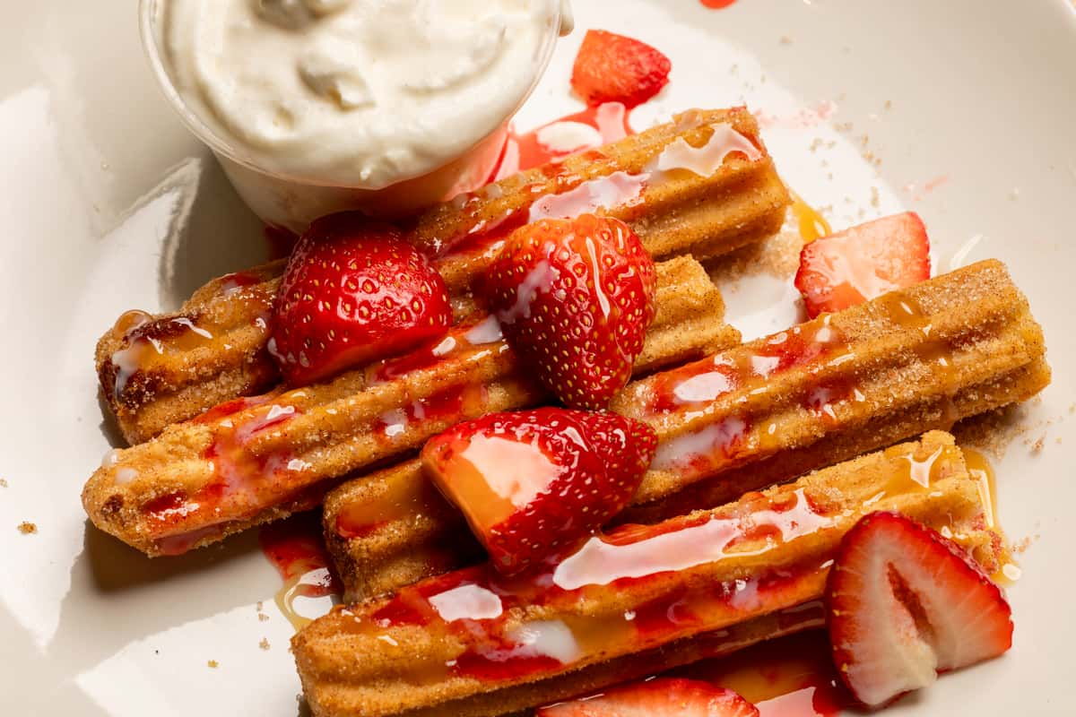 Plate of strawberry churros