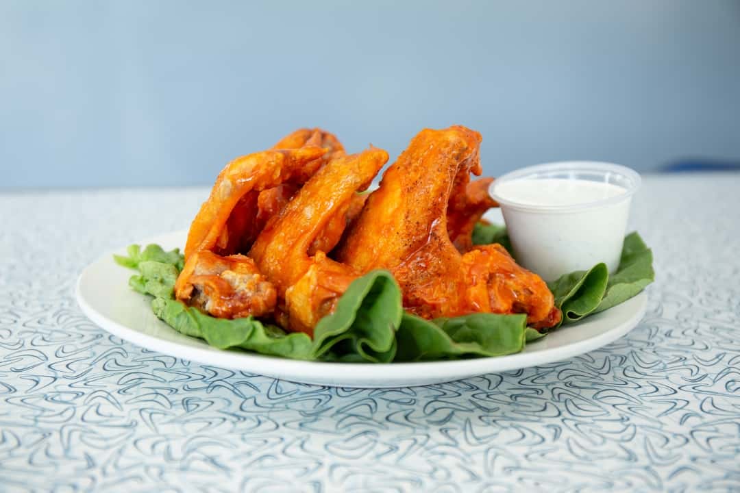 Jumbo chicken wings with ranch on a plate at The Nicollet Diner in downtown Minneapolis.