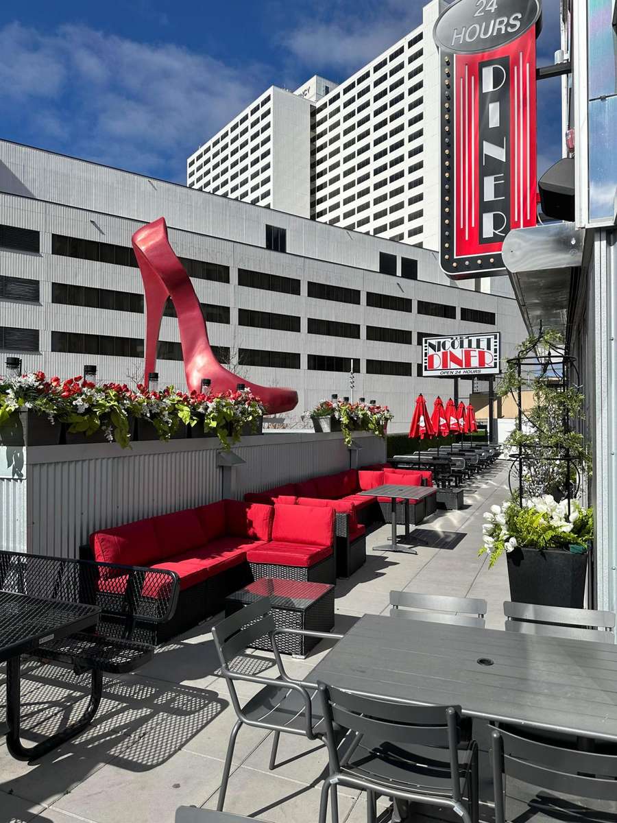 Rooftop patio umbrellas on The Nicollet Diner and Roxy’s Cabaret building on Nicollet Mall in Minneapolis.