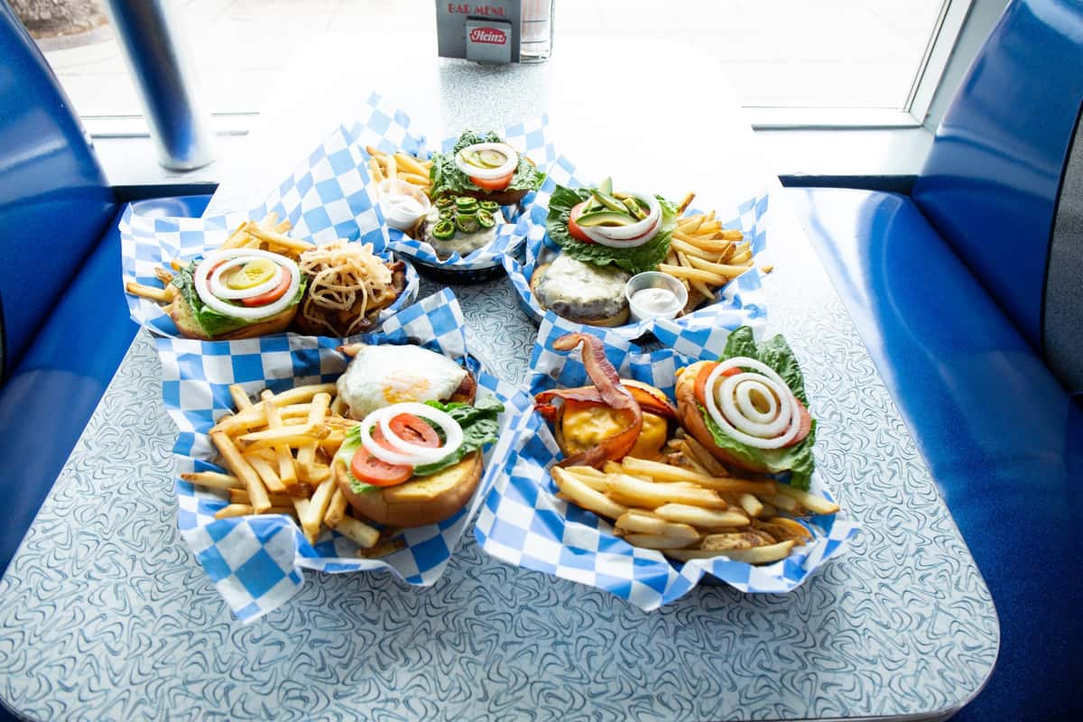 Fresh diner burgers at 1333 Nicollet Mall: Cabaret Burger, Jolly Roger, Wakin’ Bakin’, Santa Fe. Fries included. Available late night.