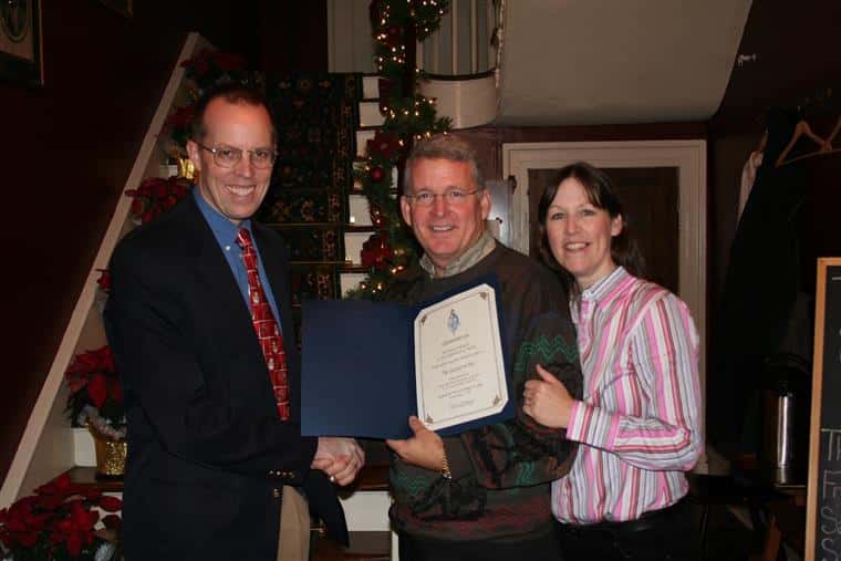 Inn Keepers Kaye and Alan receiving award inside the inn