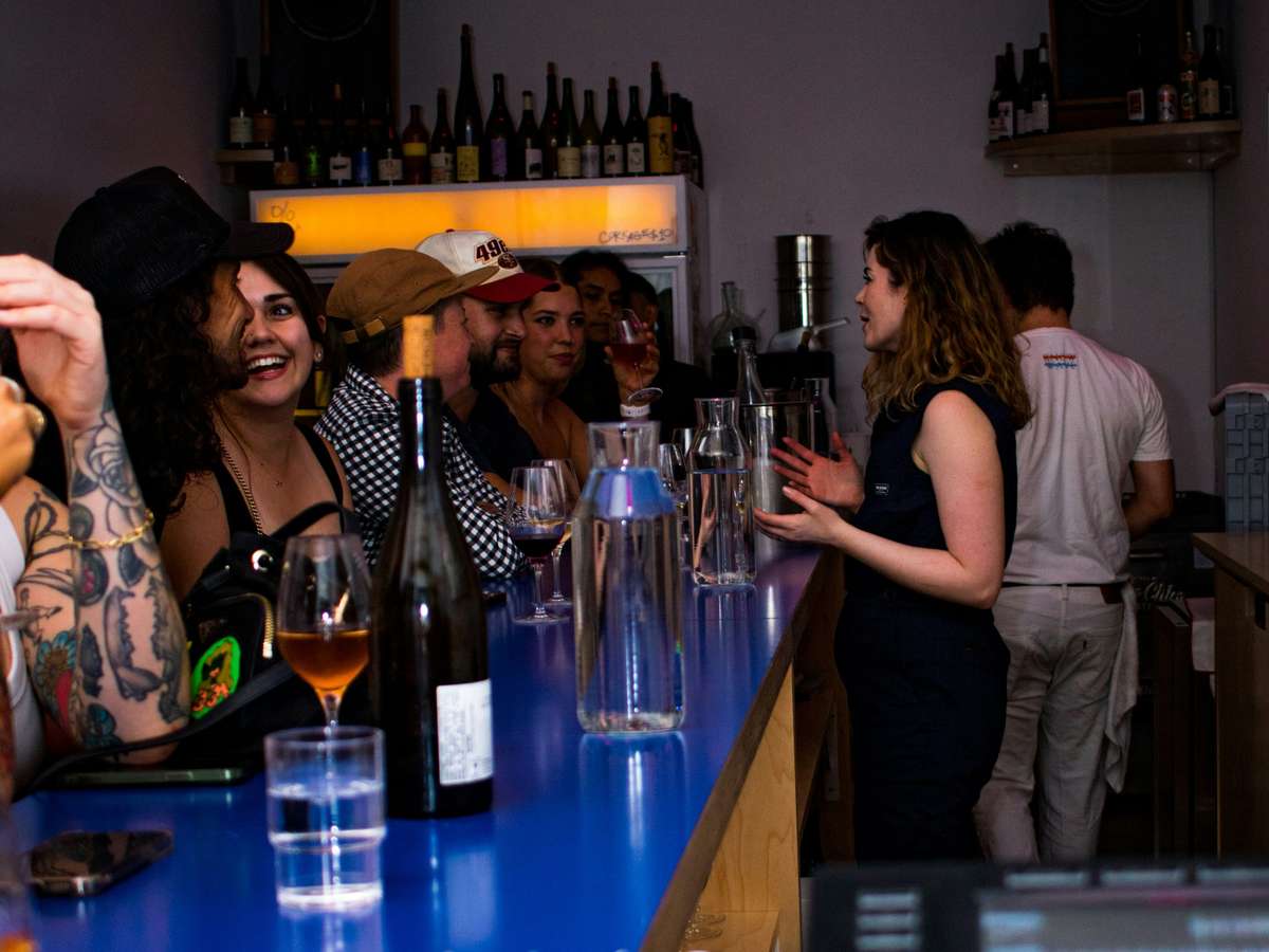People at an event with a bar