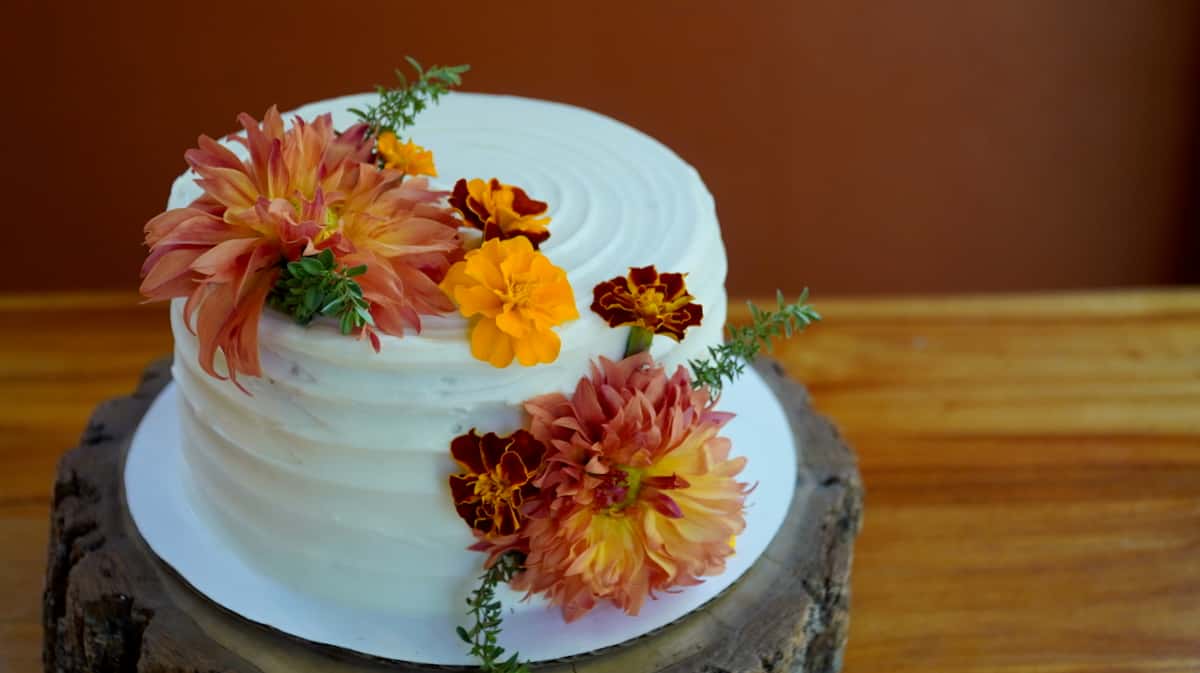 whole cake decorated with fall flowers