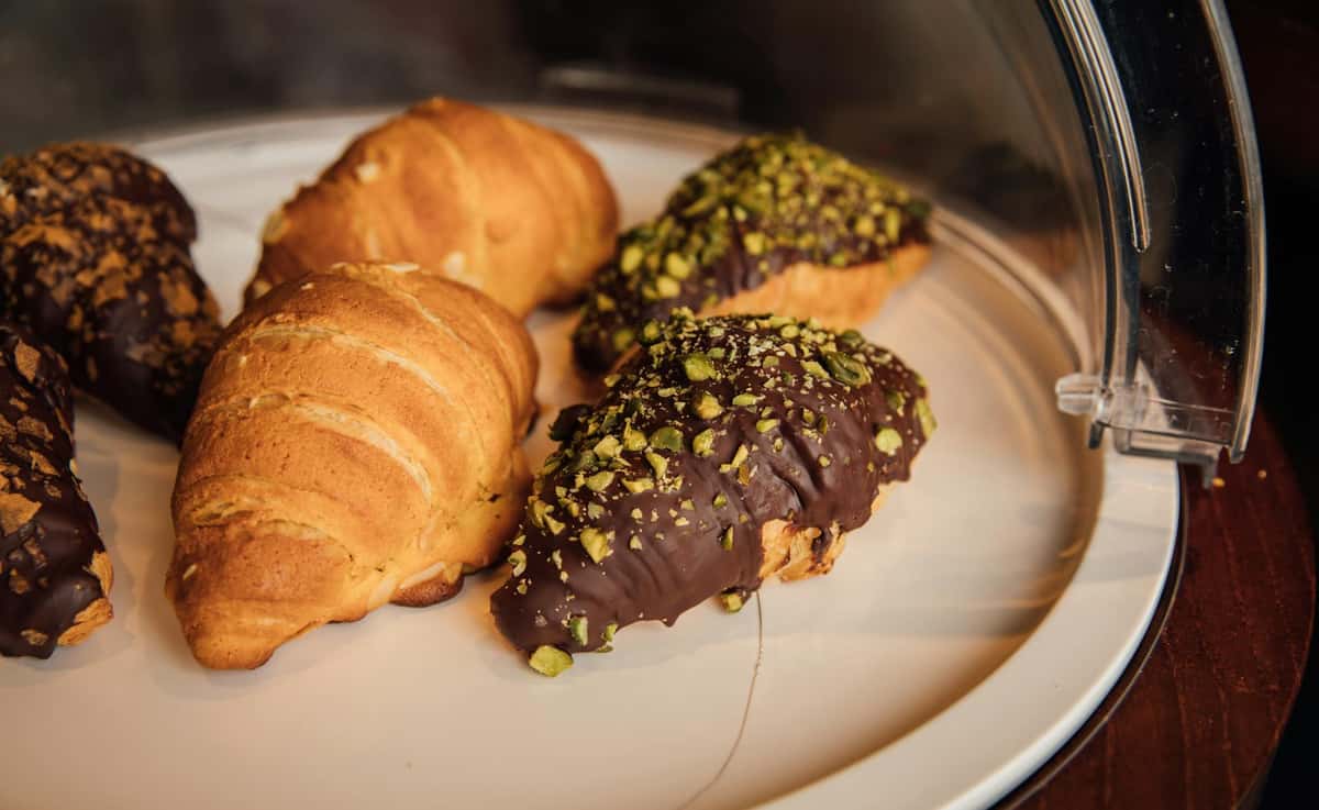 Plate of croissants on a white plate