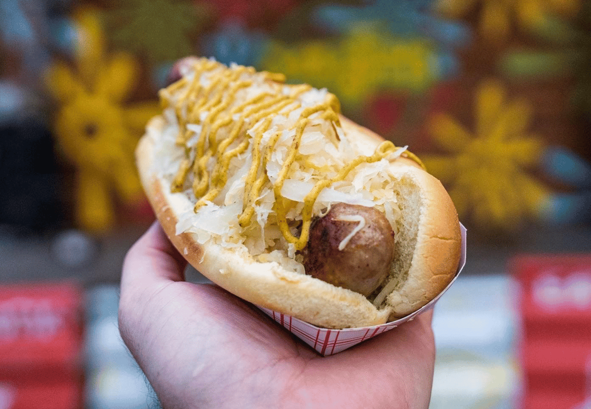 Hot dog with sauerkraut and mustard