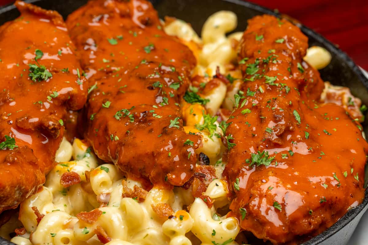 mac and cheese with buffalo sauced meat