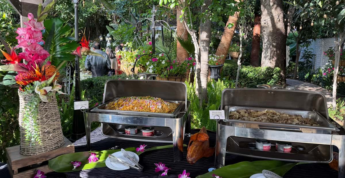 Catered food in chafing dishes at an outdoor event