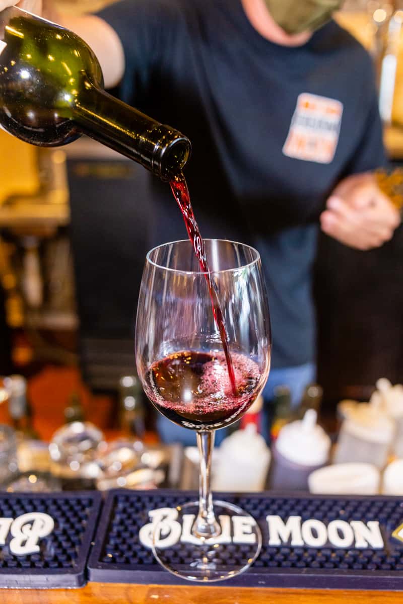 wine pouring into a glass