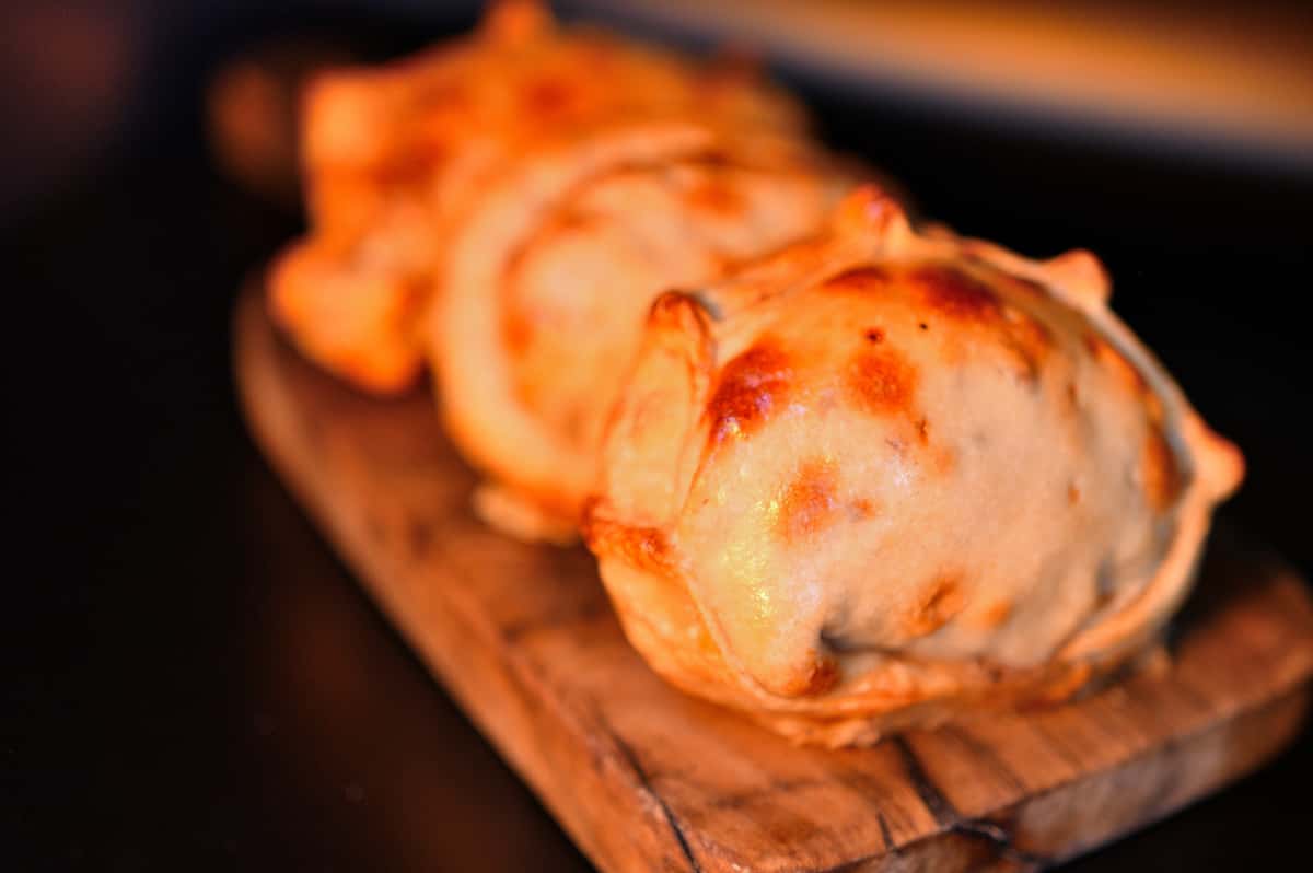 Slow Cooked Chicken, Sweet Onions, Mozzarella Cheese, Aji Molido