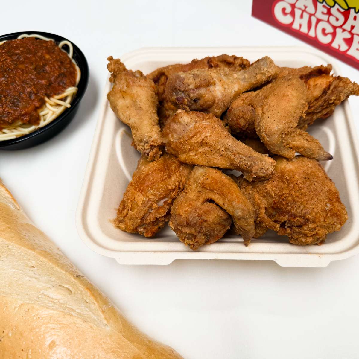 8 Pc. Bucket ( 8 Pcs. chicken with spaghetti and bread)