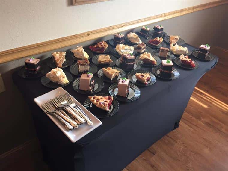 catering display of assorted cakes and pies 