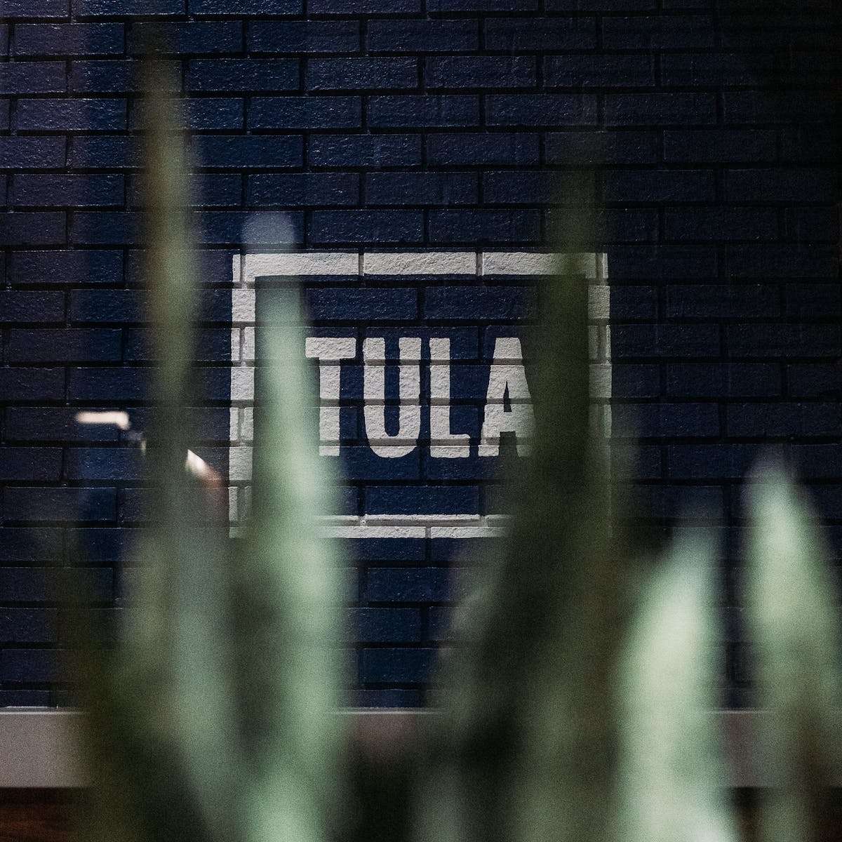 Tula logo painted on wall