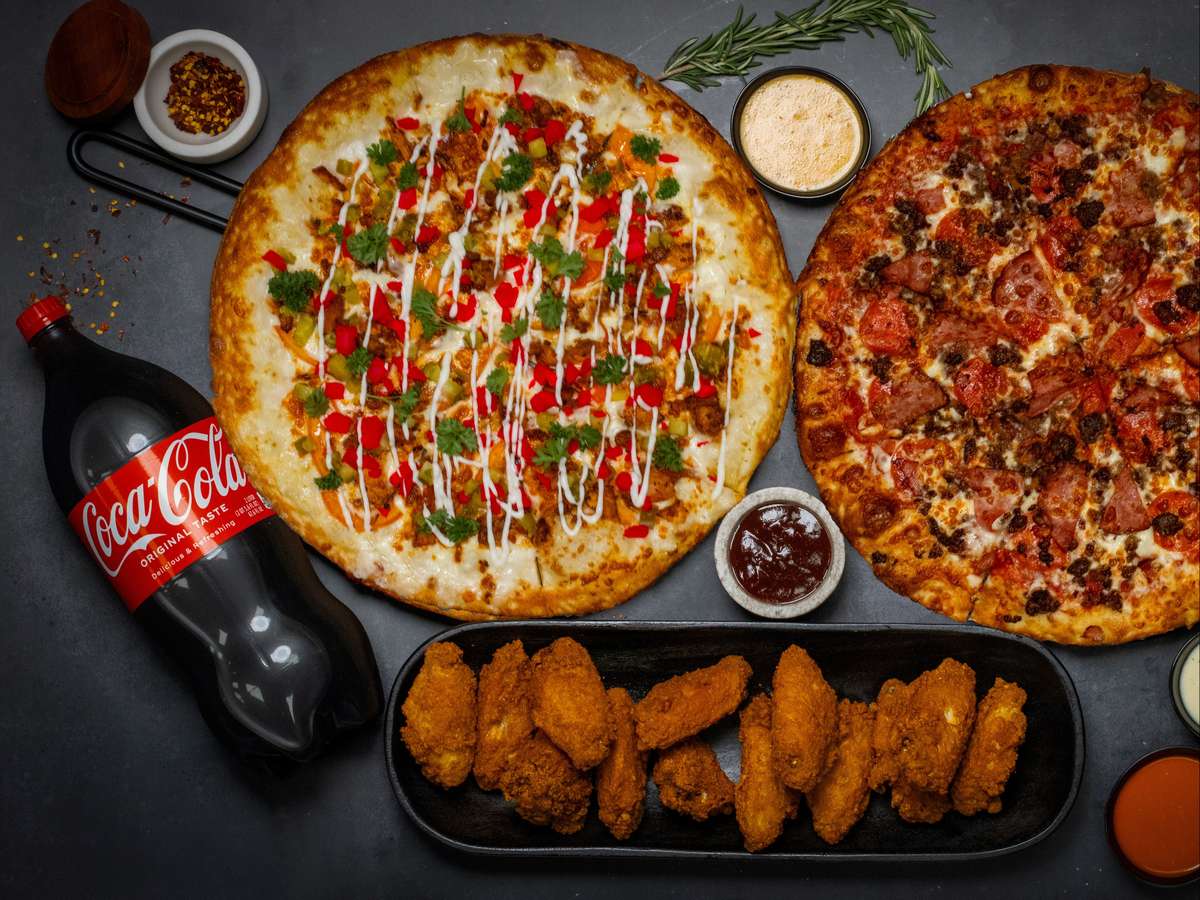 2 large any specialty pizza with 12 wings, breadsticks and a 2lt drink