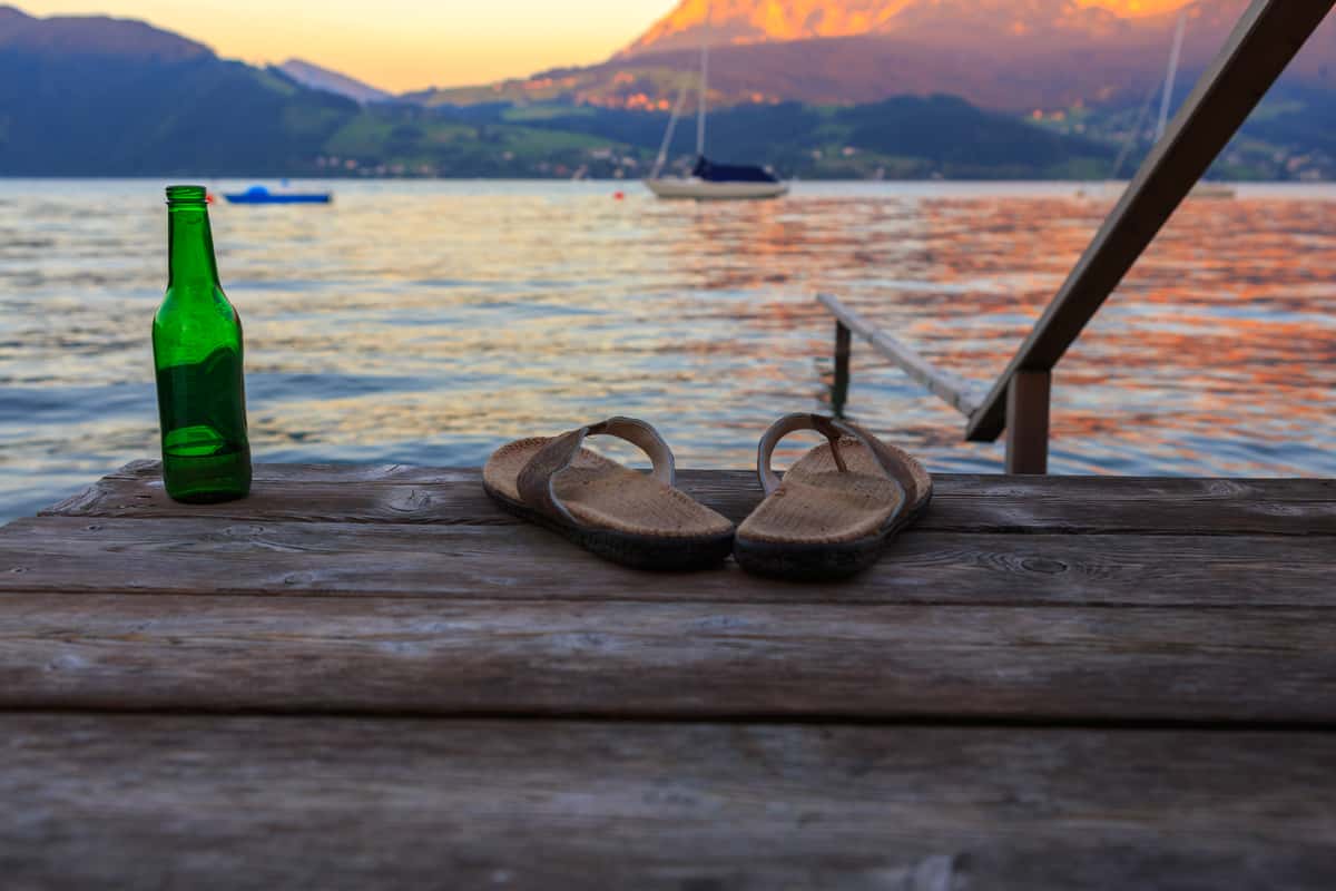 Deck with flip flops and a beer