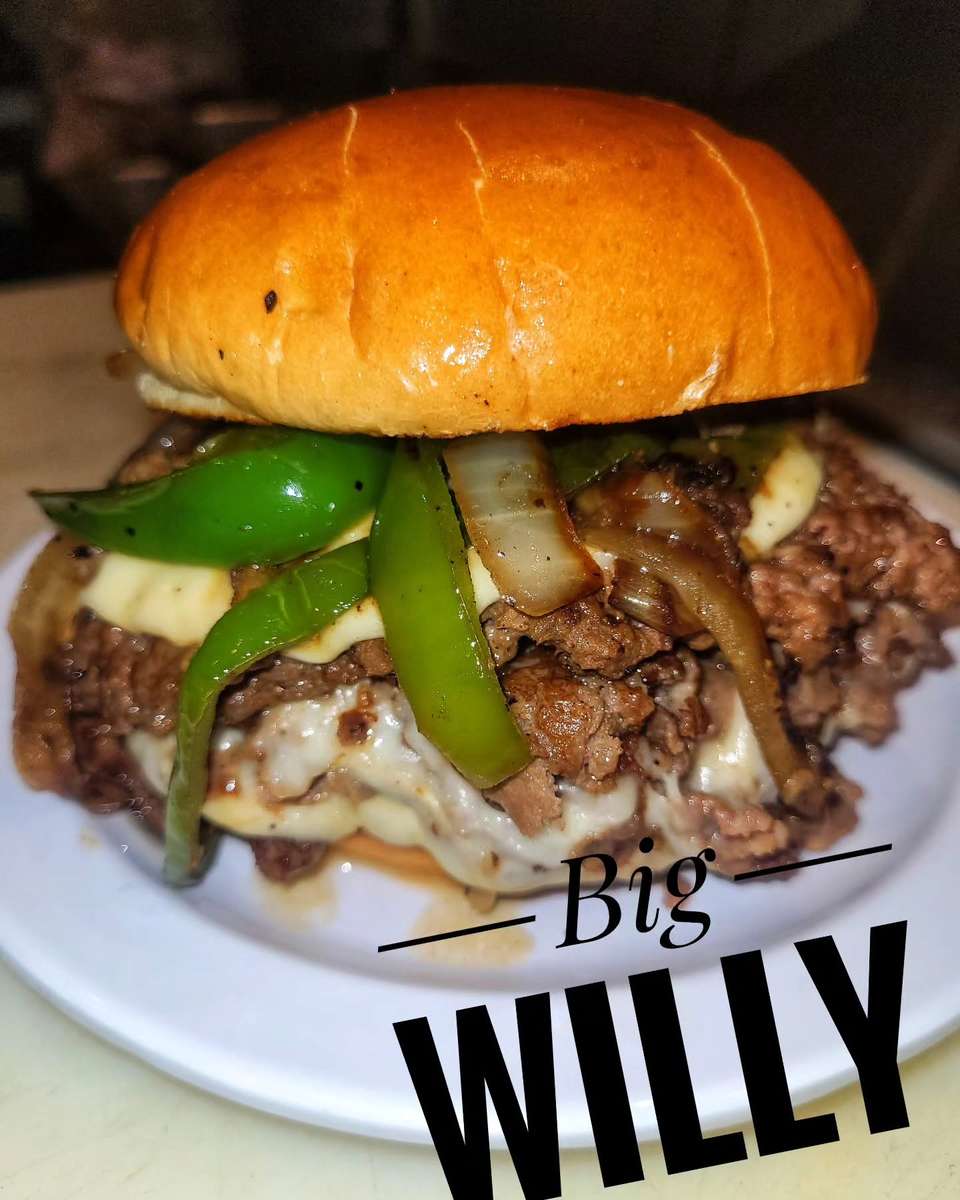 Burger called Roast Face Killah topped with roast beef and melted cheese