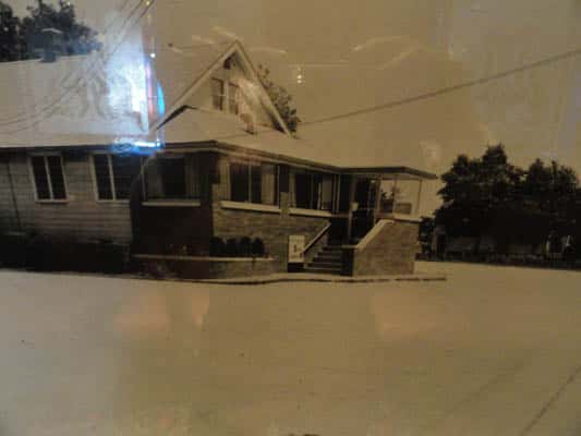 Old black and white image of the outside of the restaurant.