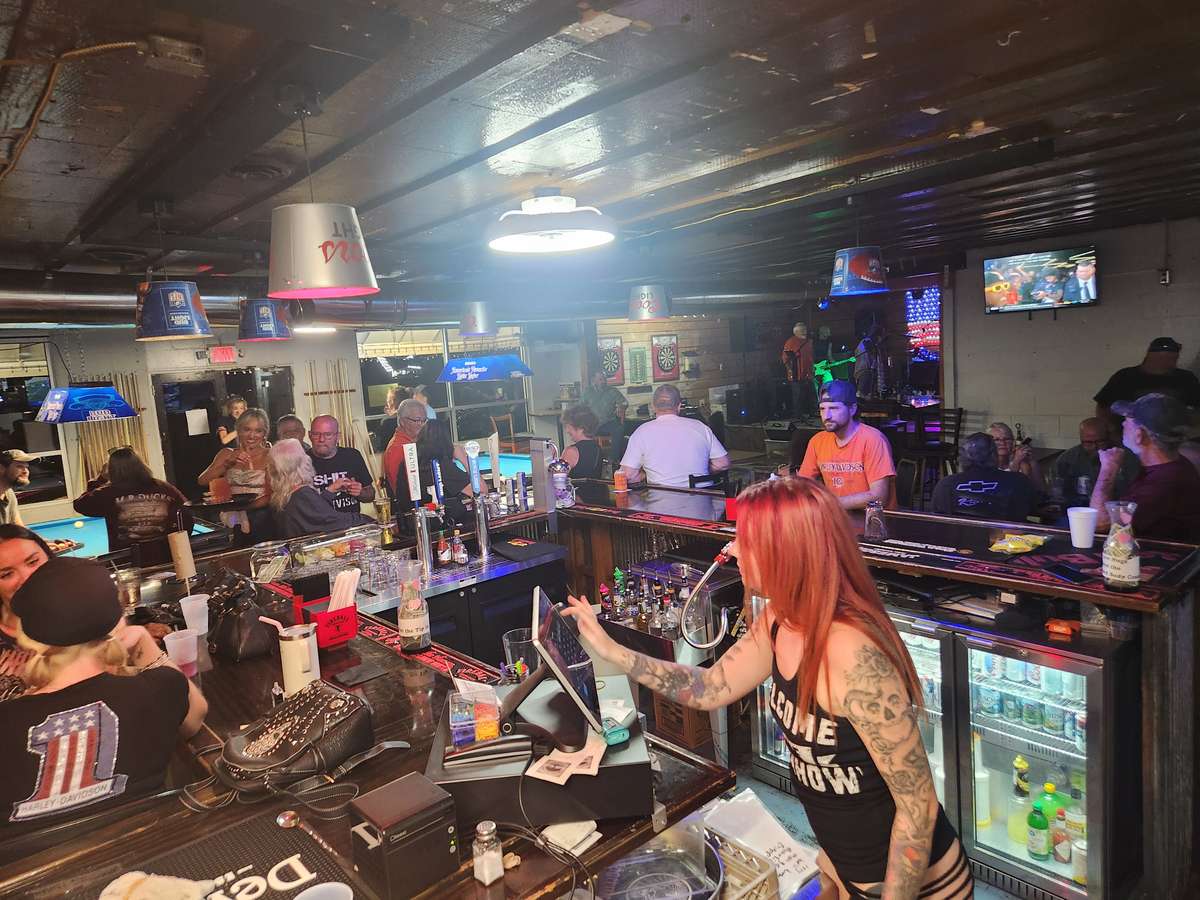 people enjoying the bar