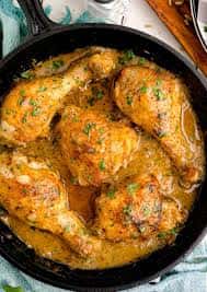 Juicy, smothered chicken smothered in a thick, homemade gravy and served over fluffy rice—slow-cooked to bring out deep, soulful flavor in every bite.