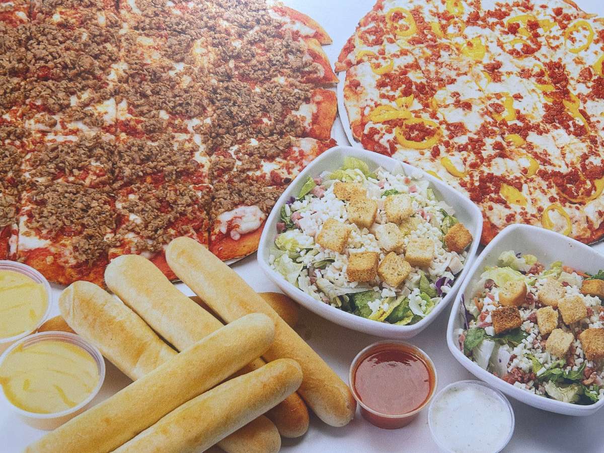Pizza, salad and breadsticks