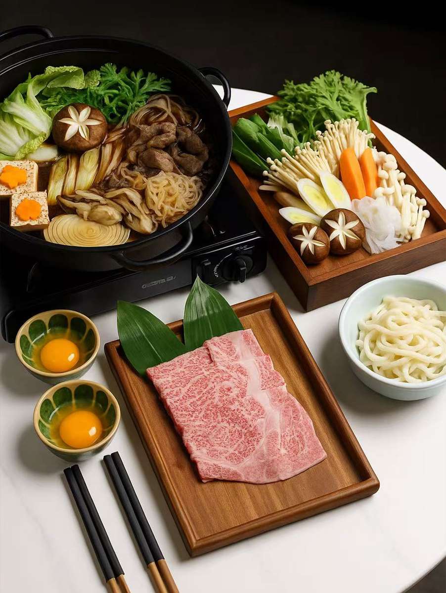 A Japanese buffet spread featuring sushi, hand rolls, tempura, and various side dishes served on a traditional wooden tray