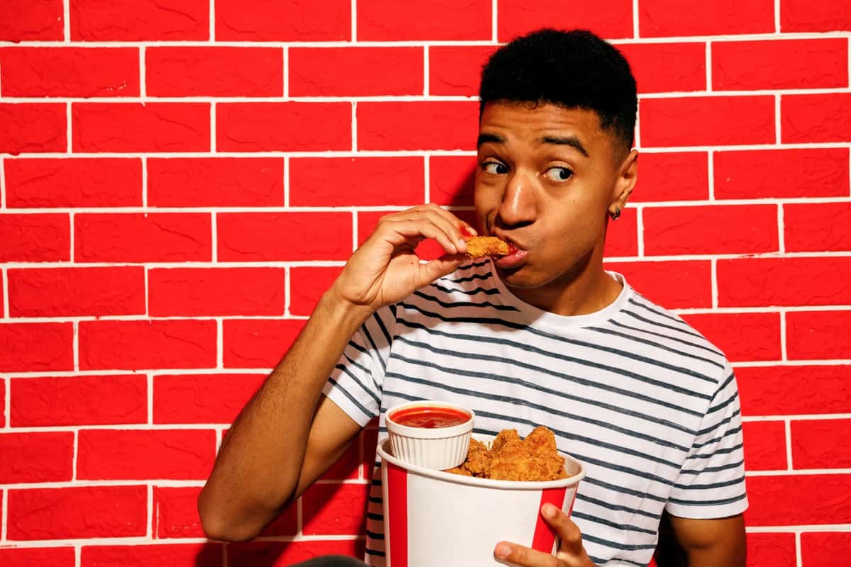 Boy eating Chicken