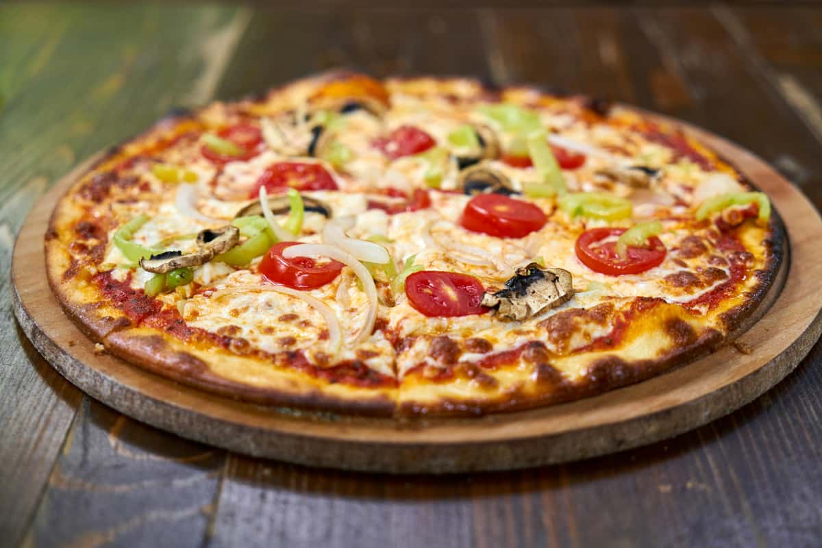 pizza with tomato, mushroom and cheese