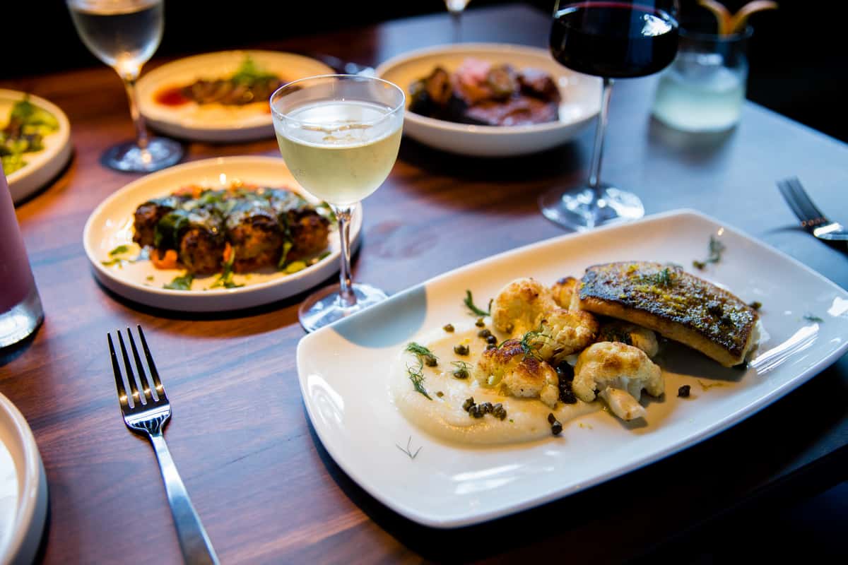An array of elevated entrees paired with wine at Westsider's