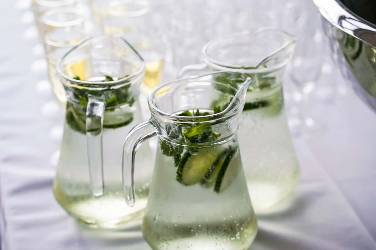 water pitchers with cucumber and mint