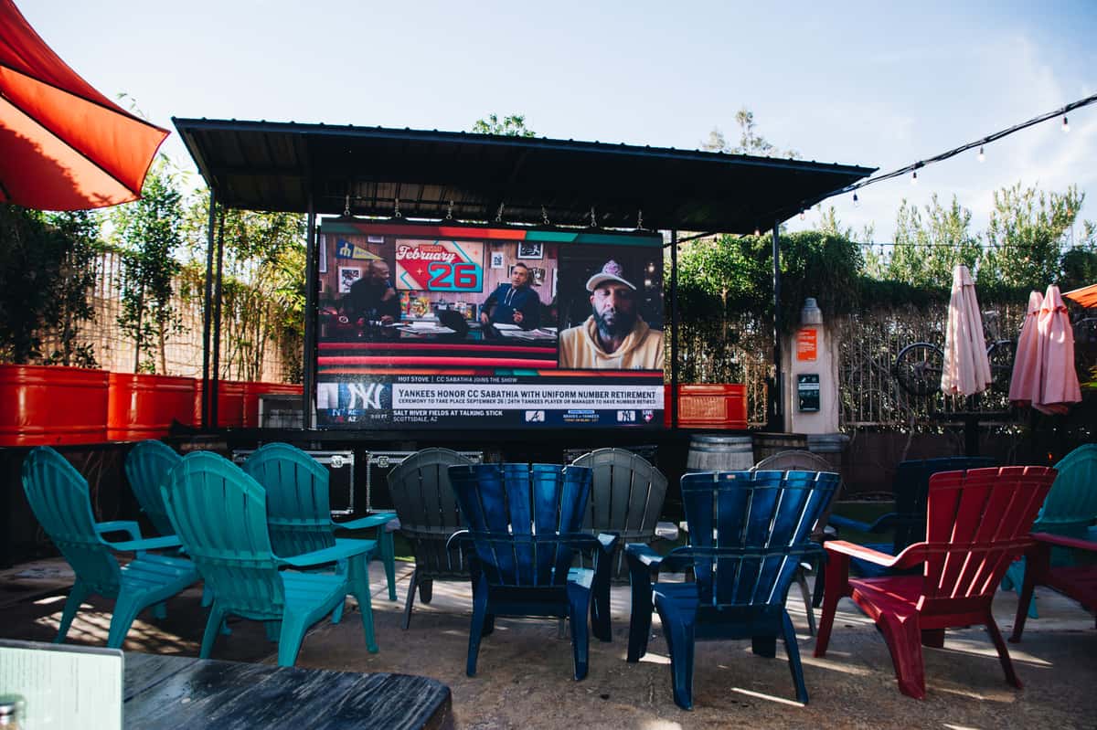 Jumbo outdoor screen and TVs throughout the patio at O.H.S.O. Paradise Valley showing NFL Sunday Ticket