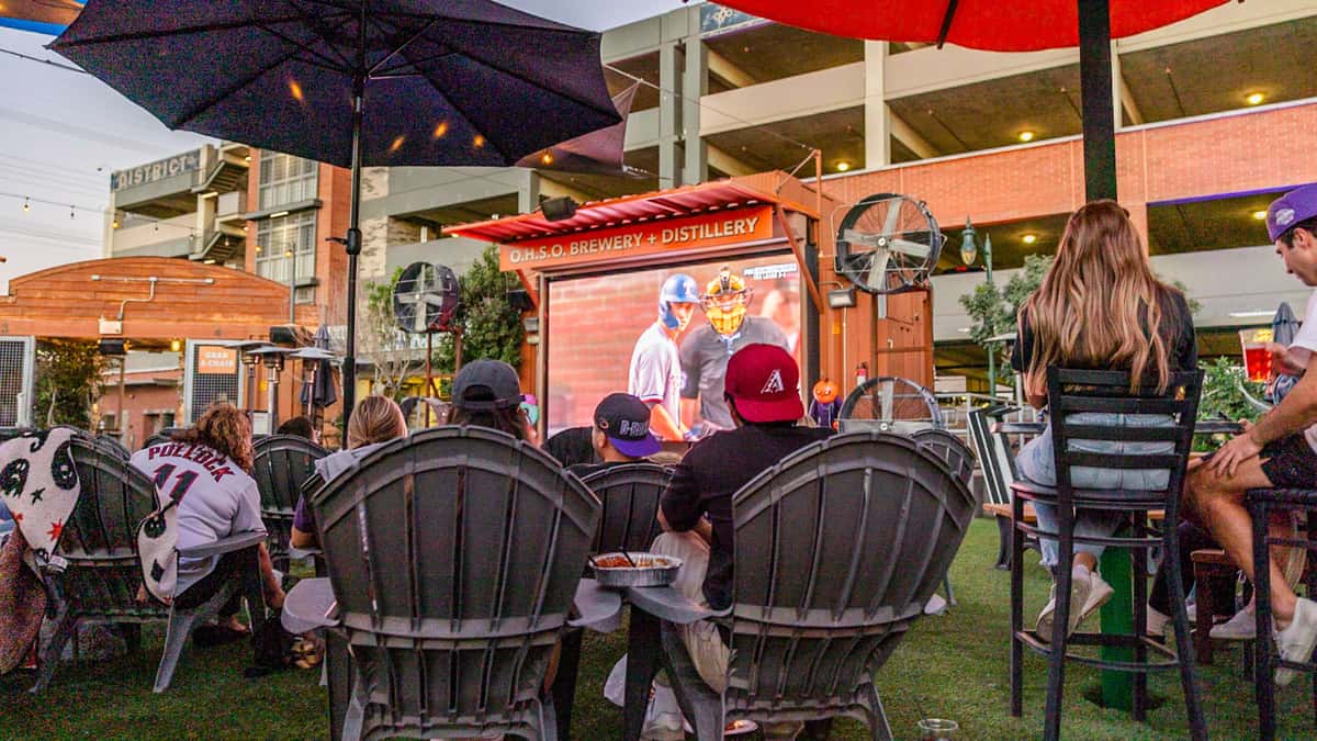 Guests watching a game on the Jumbotron at The Park