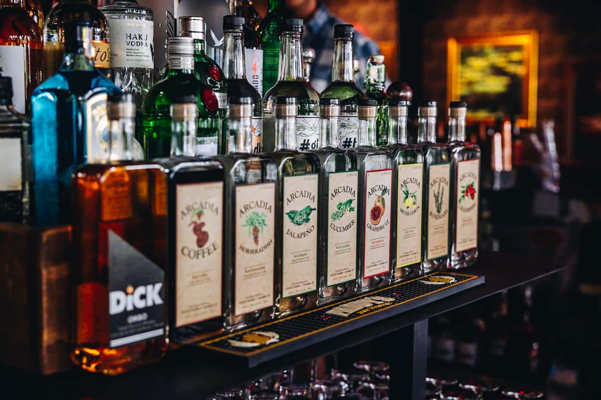 Line of craft spirit bottles at OHSO Distillery in North Scottsdale