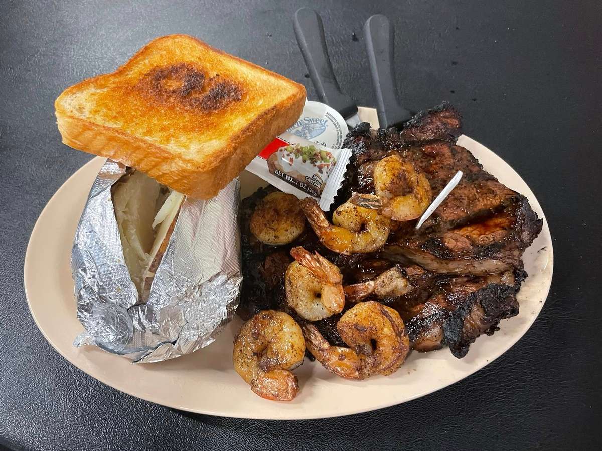Steak with shrimp and toast